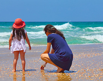 Mother and daughter Clamming on the beach!