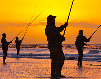 Sunset fishing on the beach